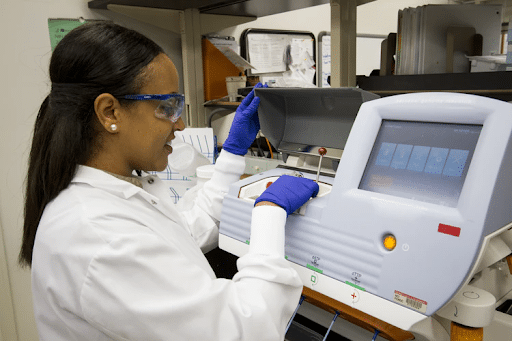 a biologist uses a centrifuge