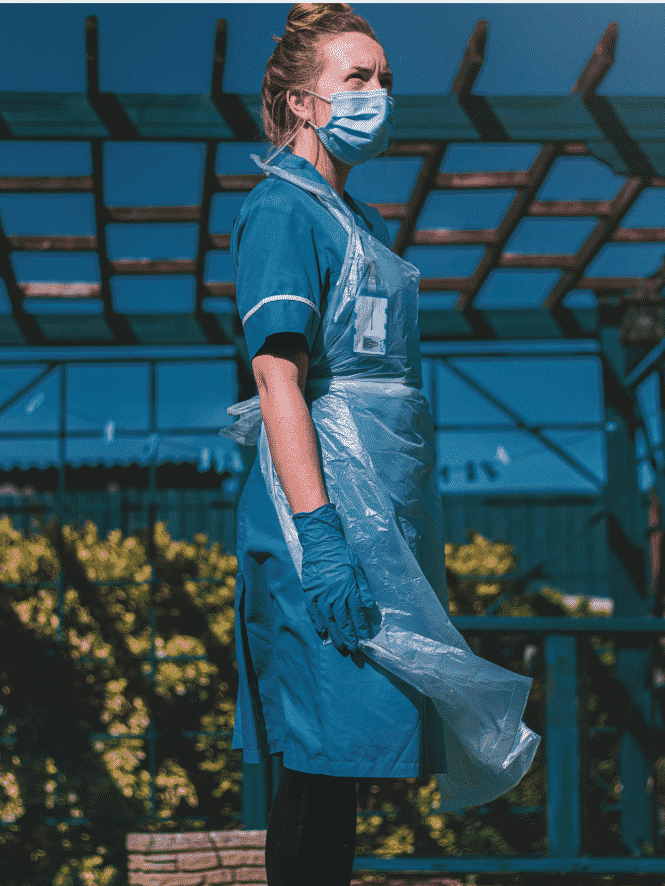 woman in blue apron
